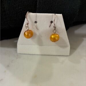 Elegant yellow pearl Drop Earrings on sterling silver hooks. Like new! 925